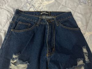 Distressed Blue Denim Jeans