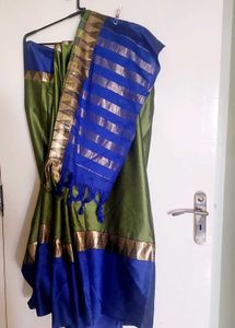 Green Silk Sari with matching stitched Blouse