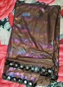 Beautiful Printed Brown Saree with Embellished Bor
