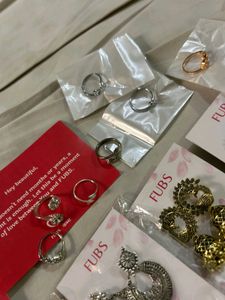 Set Of 14, 7 Rings And Earin