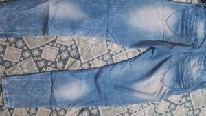 Distressed Blue Denim Jeans