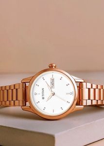 Rose Gold Titan Watch with White Dial