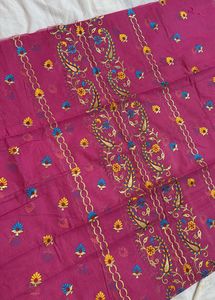 Pink embroidered fabric.