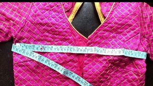 STITCHED PINK BLOUSE