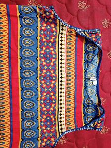 INDIDORI Brand, Multi Coloured Kurti With Beautiful 'chumki' Design On The Neck And Bottom Part.