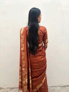 Elegant Rust Orange Saree with Gold Border