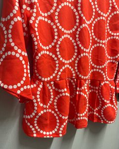 Vibrant Red Peplum Top with Circles
