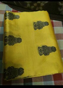 elegant yellow lichi silk saree new with tag
