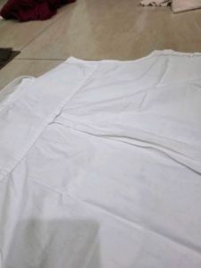 Classic White Sleeveless Button-Up Shirt