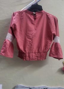 Elegant Pink Bell Sleeve Blouse with Lace Detail