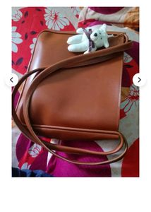 Chic Cream Shoulder Bag with Cute Charm