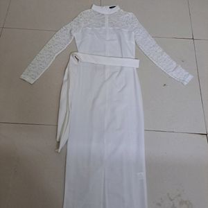 White dress with lace detailing. Belt not available