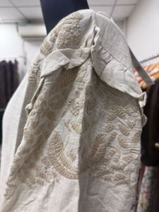 beige long sleeve embroidery top