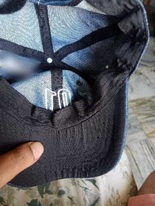 Blue denim cap.