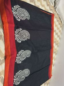 Elegant Black Saree with White Paisl