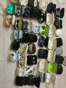 Assorted Earbud Cases and Earbuds