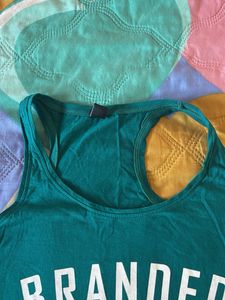 Teal-green racerback tank top.
