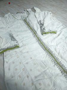 Elegant White Kurta with Green Trim