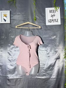 Pink Ribbed Bodysuit