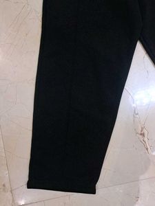 Chic Black High-Waisted Trousers with blue top