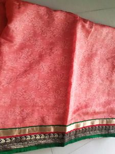 Beautiful netted peach colour Saree