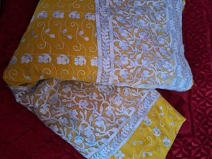 Elegant Yellow Embroidered Saree