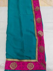 Teal Saree with Pink Border