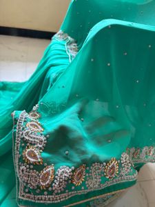 Stunning pear handwork Saree
