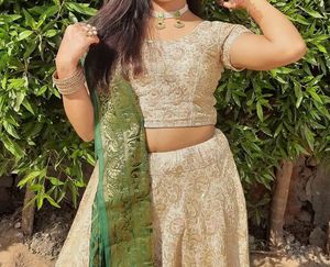 Cream Colour Lehenga Choli With Green Dupatta