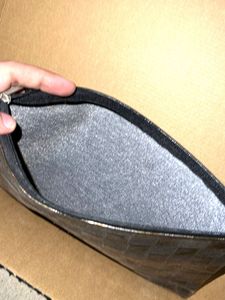 Stylish Woven Pouch with Feather Design