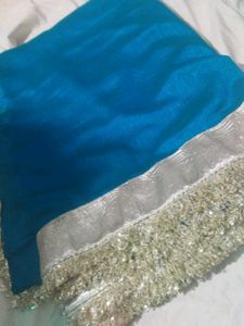 Beautiful Teal Saree with Silver Border