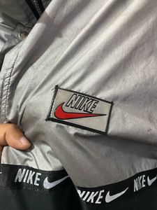 nike lightweight silver jacket