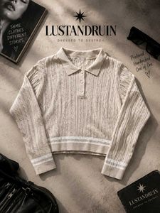CABLE KNIT POLO SWEATER.
