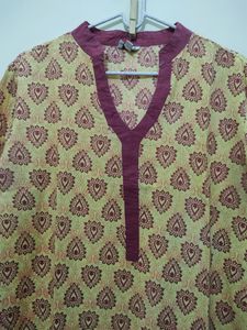 Ruhaans Yellow Kurta With Maroon Prints And Trim