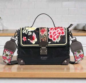 Embroidered Black Handbag with Floral Strap
