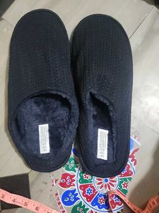 Cozy dark blue knitted slippers