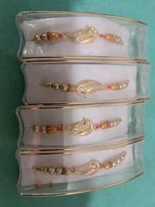 Set of 4 Elegant Gold Tone Bracelets