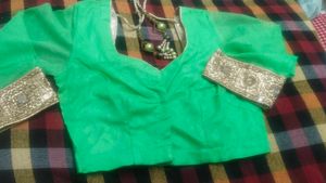 Vibrant Green Blouse with Golden Embellishments