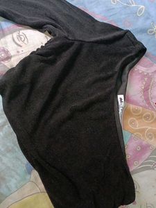 Black shiny top