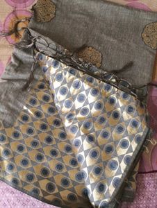 Elegant Grey Saree with Traditional Motifs