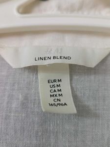 White Sleeveless Top
