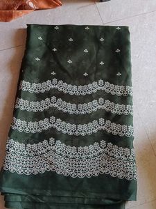 Elegant Dark Green Saree with White Border