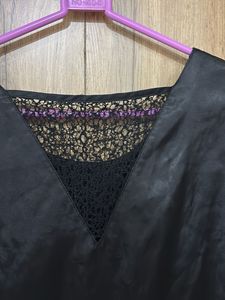 Chic Black Satin Romper with Lace Detail