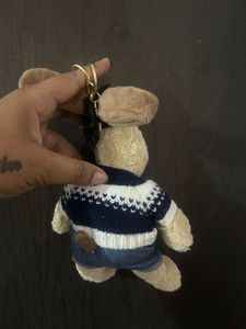 plush Gromit character keychain wearing a blue