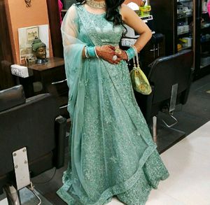 Pista Green Lehanga With Net Duppta