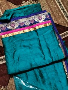 Elegant Teal Silk Saree with Embellished Border