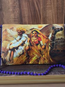 Ethnic Art Clutch with Pom-Poms