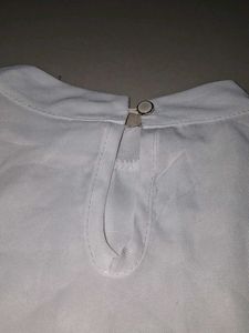 Elegant Sleeveless White Top