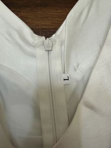 Elegant White Peplum Top