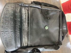 Victoria cross leather bag